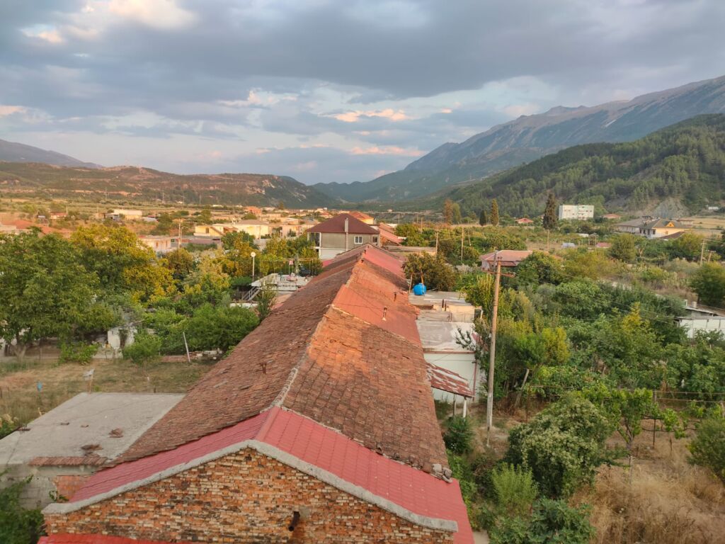 Rooftops, trees and mountains in Prmet 