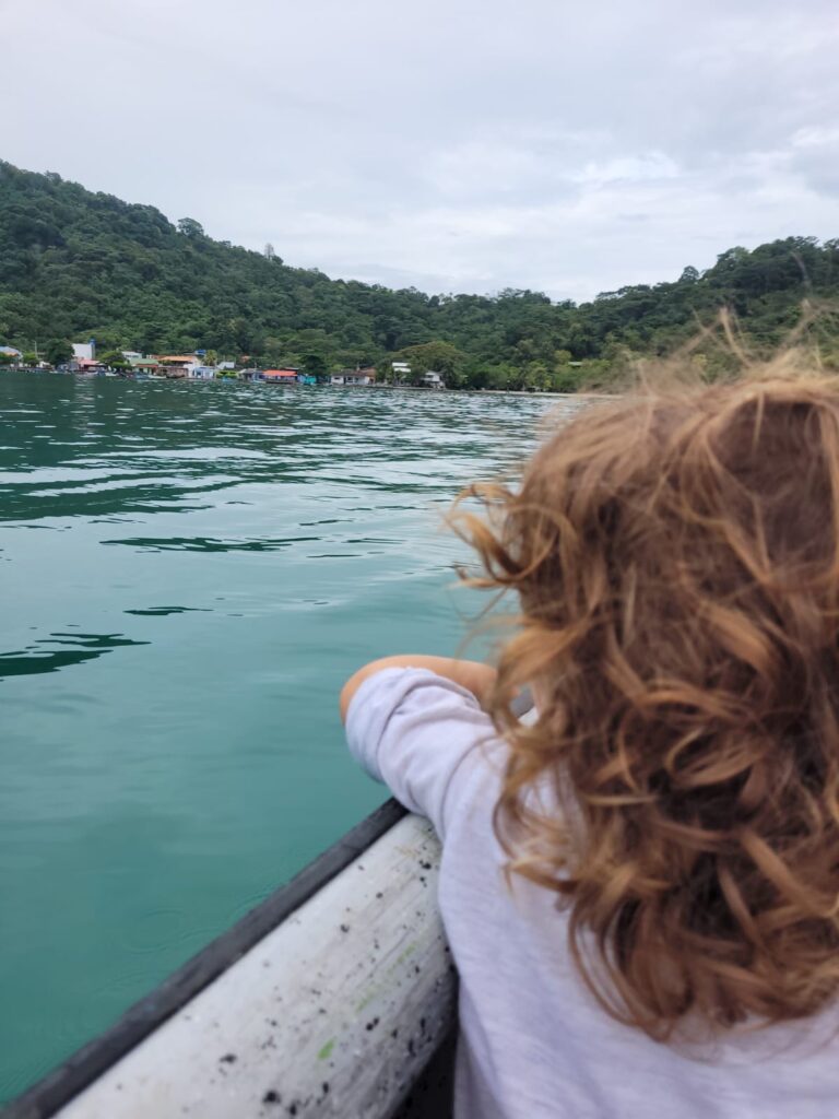 A child on a boat riding from Capurgana to Sapzurro 